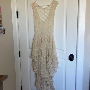 Free people cream lace dress size M with layered lace bottom and low cut back